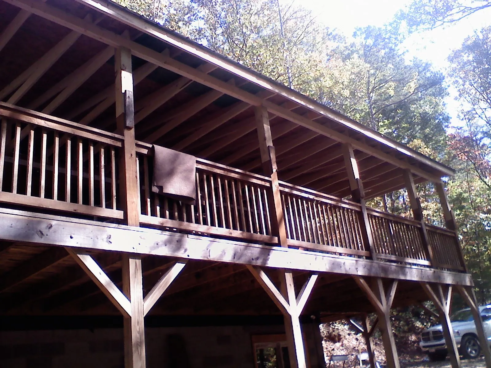 Timber framing under a new elevated porch and deck — Roof Leak Repair in Fields by Roofing Brothers
